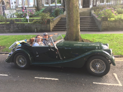 bluhm@ and patrick@ in a Morgan sports car in England